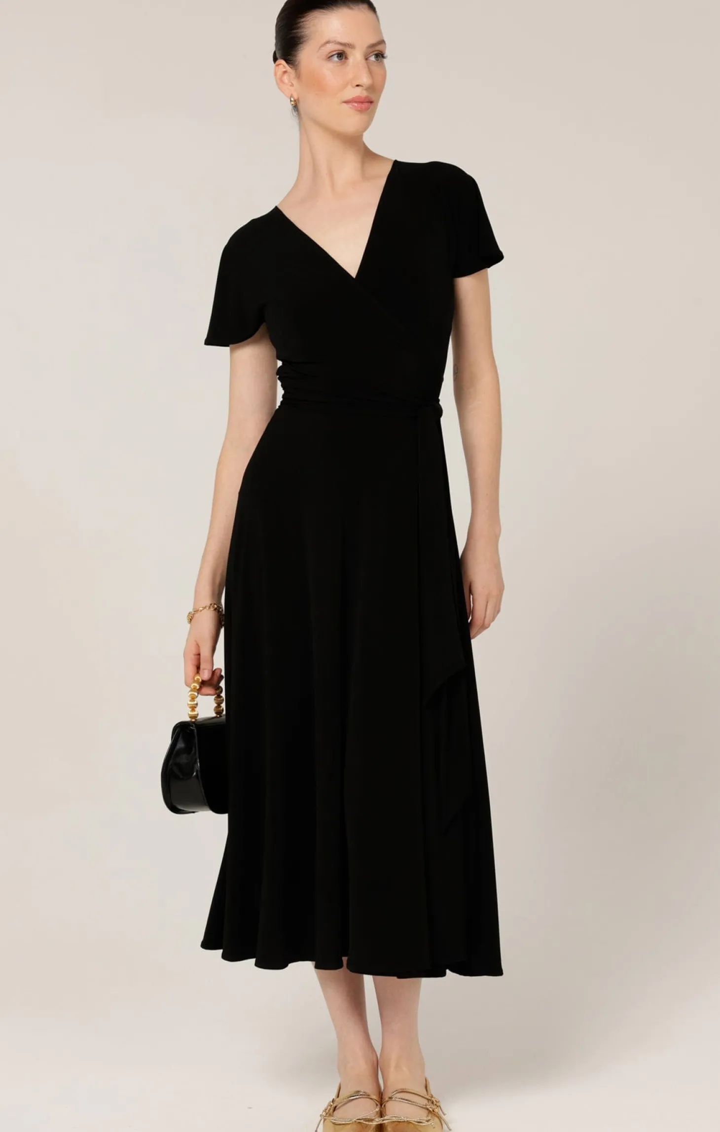 FLUTE SLEEVE REVERSE WRAP IN BLACK