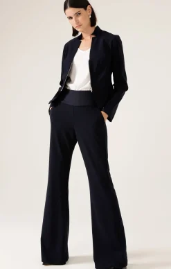 FRONT ZIP PEPLUM JACKET IN NAVY
