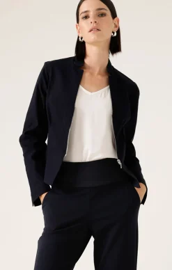 FRONT ZIP PEPLUM JACKET IN NAVY