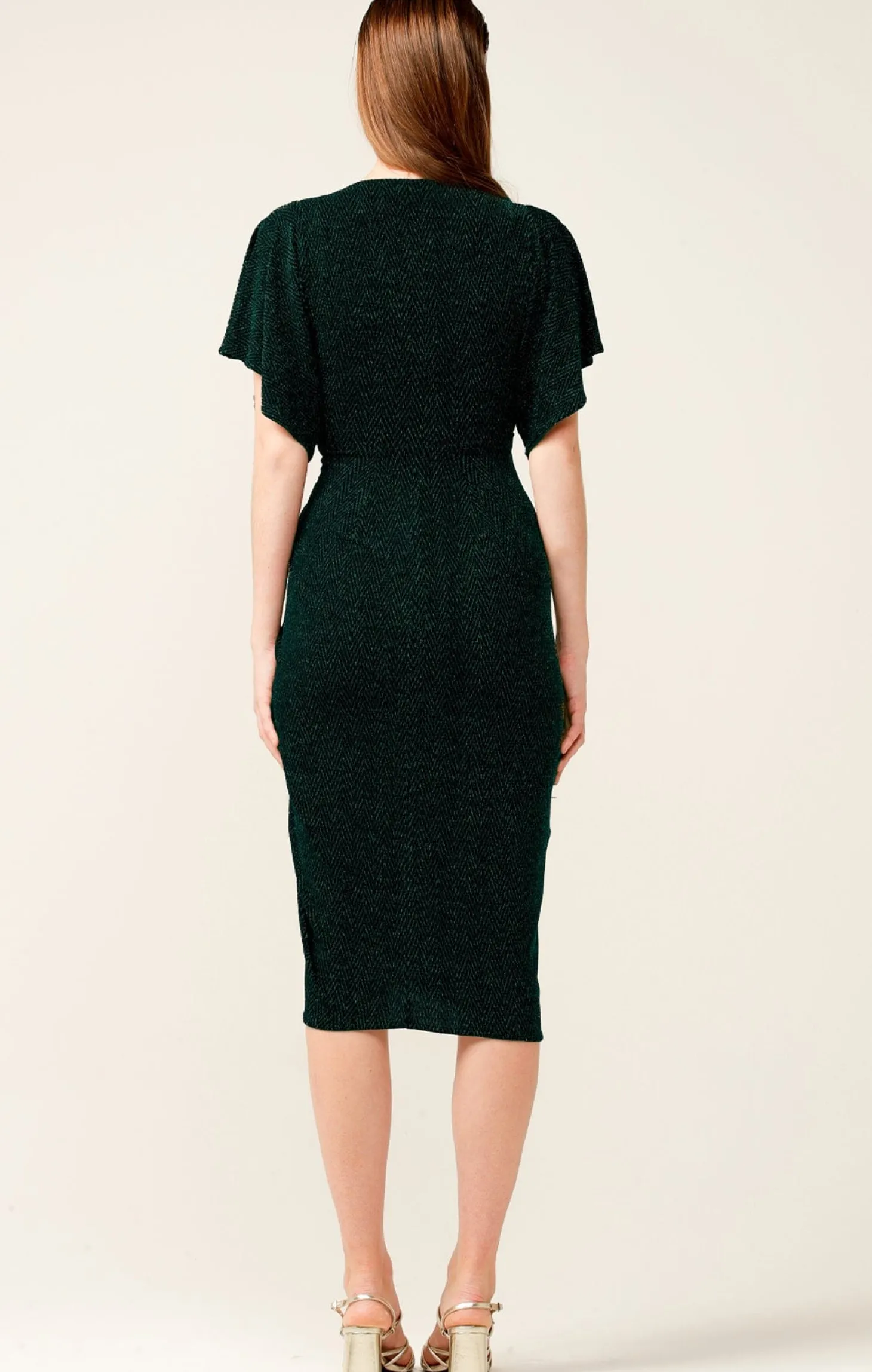 THE EMPORIUM DRESS IN EMERALD